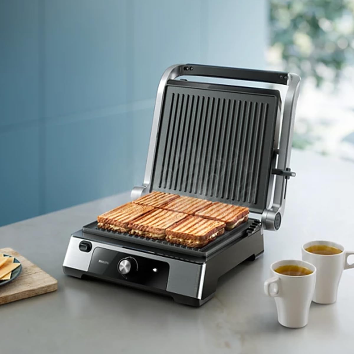 Philips Kontaktgrill - Temperaturfühler und 8 Voreingestellte Funktionen Grill mit großer Grillfläche. Digitale Temperaturregelung 60°C-220°C. Leicht zu reinigen (HD6307/70)