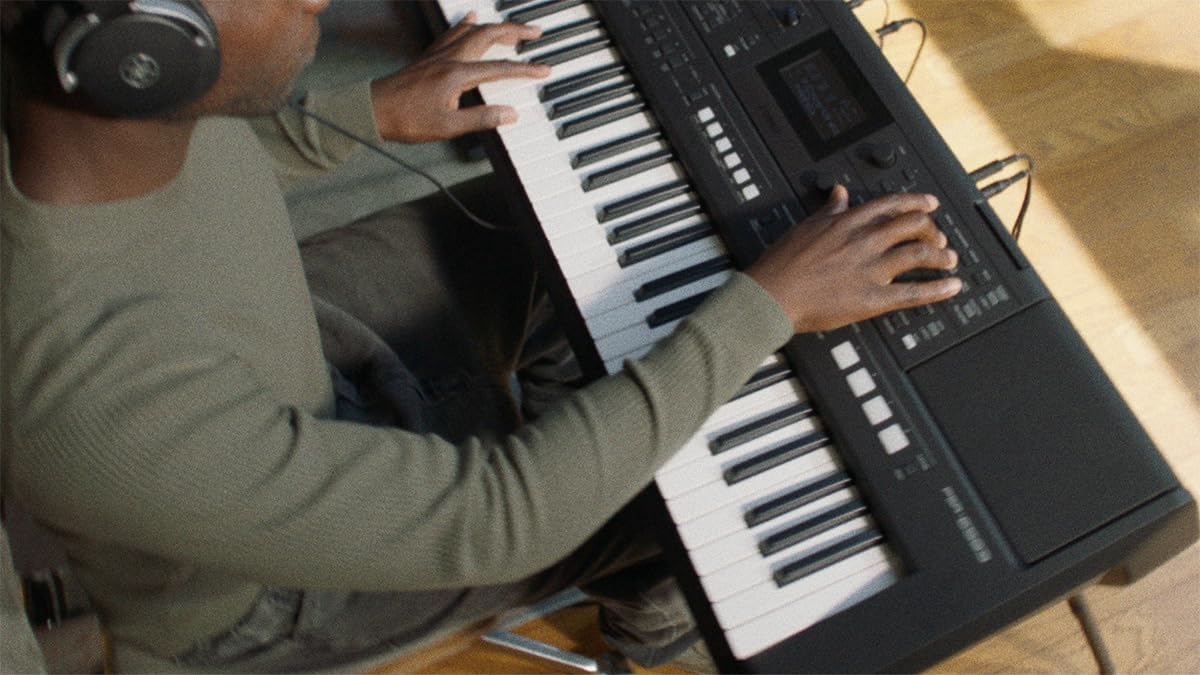 Yamaha PSR-E483 61-Key Touch-Sensitive Portable Keyboard with Sound, Music Rest and Power Adapter