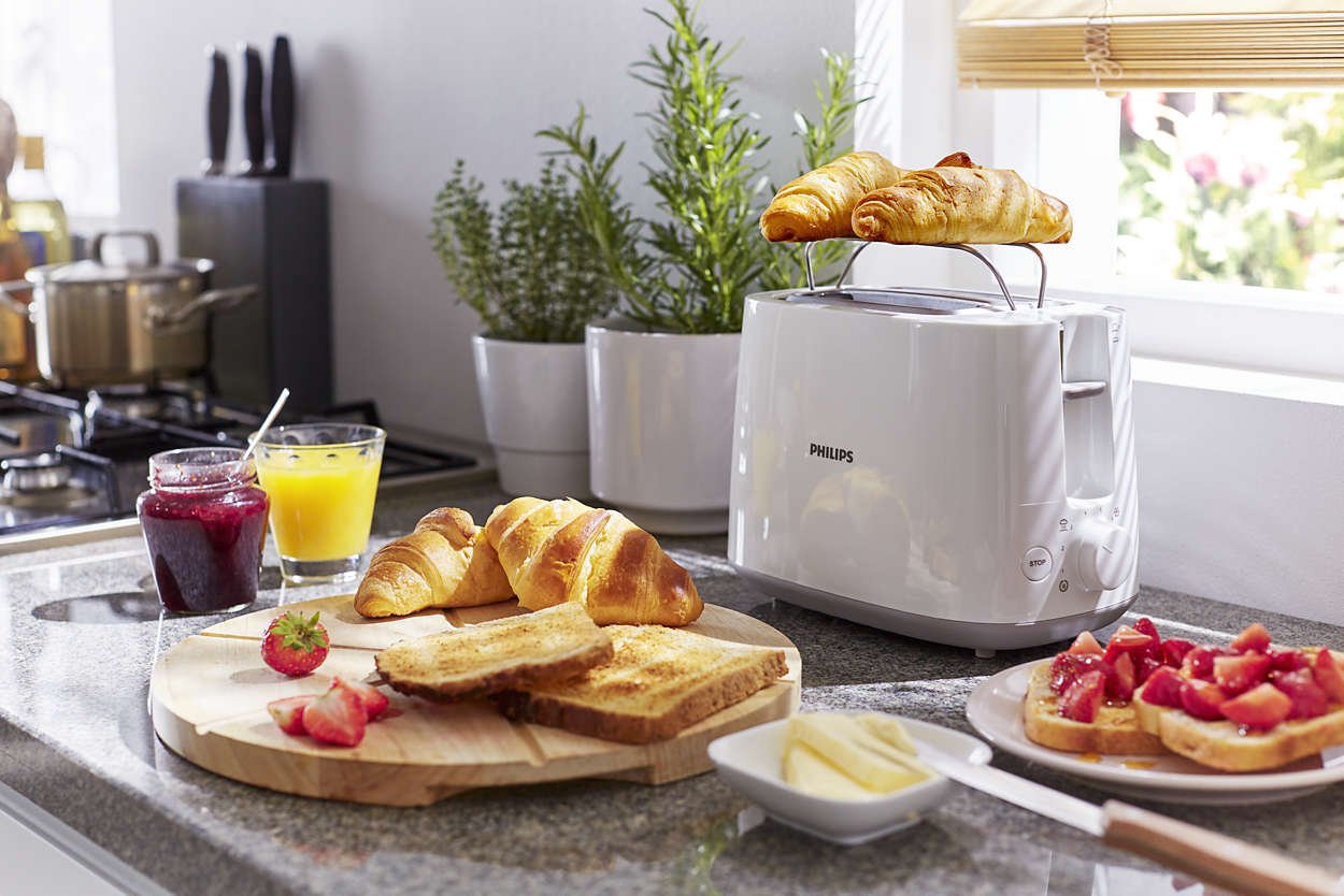 PHILIPS 2 Slice Daily Collection Toaster HD2581/01, With 8 settings and integrated bun warming rack, 2 large variable slots for different size of bread