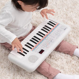 Yamaha Remie PSS-E30 - Portable and Lightweight Keyboard for Young Children, 47 Built-in Voices, 74 Sound Effects and a Quiz Mode, Fun Learning Instrument, in White